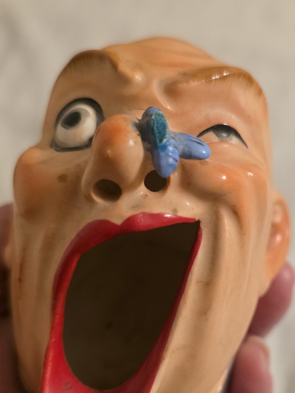 Vintage "Man with fly on nose" ceramic ashtray/cigarette holder